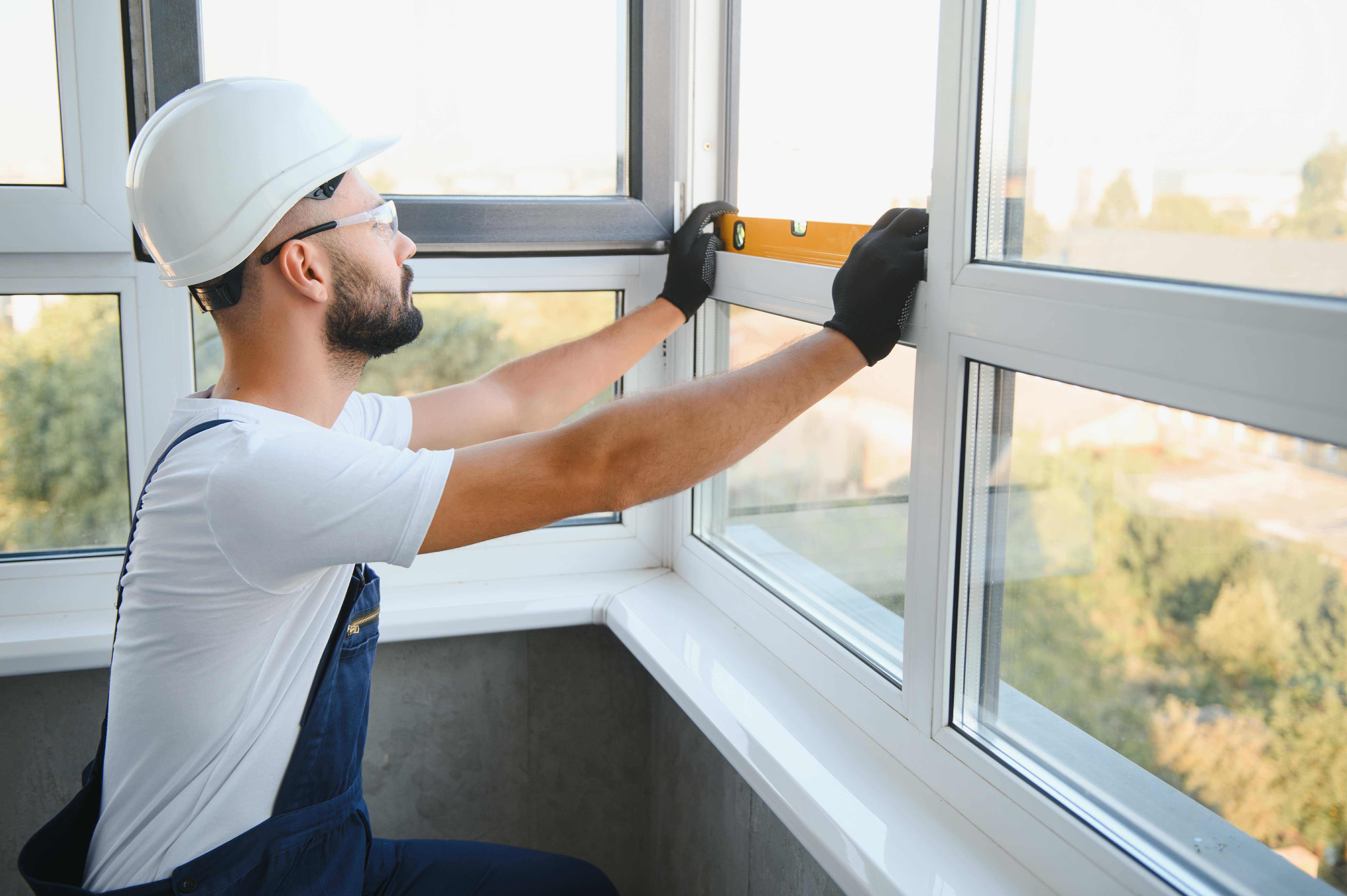 Expert installers from My Window Solutions carefully replace an energy-efficient window in a Thousand Oaks home, ensuring perfect sealing and fit.